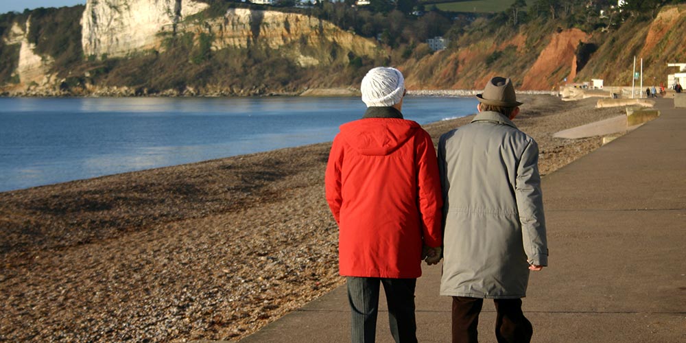 couple walking along the seaside